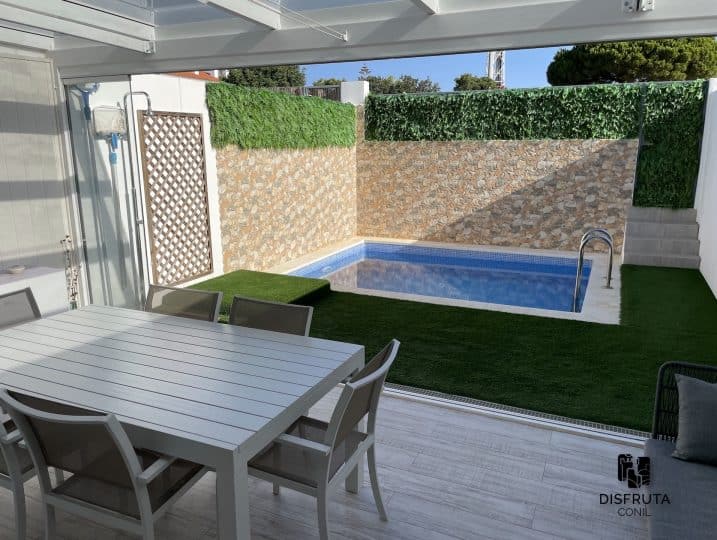 Casa Aiora, view from the veranda to the pool